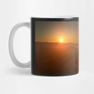 Aerial view of sunset over mountain jungle Mug